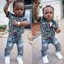 Black Boss Baby Boy Laying Down Pin On Cute Kids
