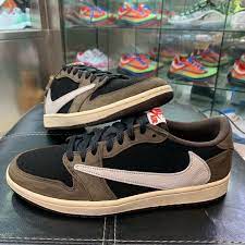 This collaborative air jordan 1 features a mix of earthy brown nubuck and white leather, and although it's not shown, a cactus jack tongue badge alongside a hidden pocket around the ankle. Travis Scott X Air Jordan 1 Low Detailed Preview Pictures Eukicks Air Jordans Jordan 1 Low Travis Scott