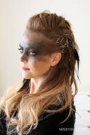 In this style the front hair is raised above the forehead, giving a shield type look, while the other part of the hair is very tightly and closely braided, to give you that nice ponytail look. Viking Warrior Halloween Hairstyle Missy Sue