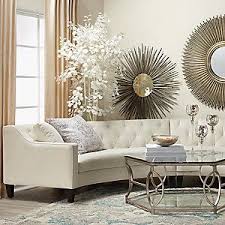 They say that variety is the spice of life, and at kirkland's, our selection of wall decorations has enough variety to spice up your wall decor. Luxurious Beige Curved Sofa With Antique Gold Decoration Pieces Living Room Furniture Inspiration Lavish Living Room Gold Living Room Decor