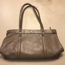 14,661 logos of 489 brands, shapes and colors. Bags Dark Beige Classic Handbag With Lion Logo Poshmark