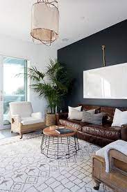 Add a black accent wall to your living room for a beautiful dark contrast. Achieve Balance Leather Couches Living Room Leather Sofa Living Room Black Accent Wall Living Room