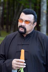 The same photo of Steven Seagal holding a carrot every day added a new...