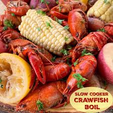 Add live crawfish, onions, garlic, lemons, and corn to your boil basket and carefully lower into boiling water. Slow Cooker Crawfish Boil Fit Slow Cooker Queen