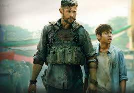 We get a brief flash of this action at the beginning of the film, with rake taking several bullets and dragging his bloody body across the concrete. Extraction Hemsworth In Netflix Action Thriller Cinecelluloid