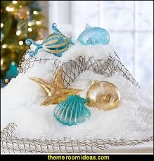 Beach and coastal decorating ideas are great for making the blue turquoise water and the white sandy beaches a part of your home décor. Decorating Theme Bedrooms Maries Manor Coastal Christmas Decorating Ideas Beach Christmas Decorations Coastal Christmas Tree Ornaments Coastal Holiday Decor Beach Themed Christmas Decorations Beachy Christmas Decor