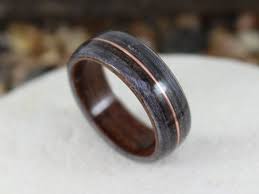 Rosewood Grey Maple Wooden Ring With Dinosaur Bone Etsy Dinosaur Bone Ring Wood Rings Wooden Rings