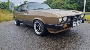 Image result for Oyster Gold 1978 Capri