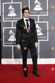 Adam followed this success with his second album 'trespassing' which became the first album to reach the. Photos And Pictures Adam Lambert Arriving At The 2010 Grammy S Staples Center Los Angeles Ca January 31 2010