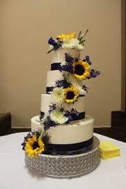 Beautiful Country Wedding Cake With Flowers By Lupin And Lilac Sunflower And Navy Blue Sunflower Wedding Cake Sunflower Themed Wedding Blue Sunflower Wedding