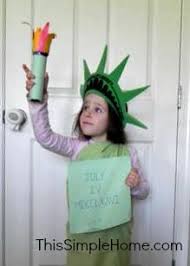 Tape them into a ring shape on the back of the torch. Diy Statue Of Liberty Costume This Simple Home
