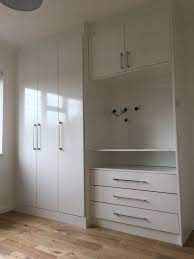 The Perfect Solution For Fitted Wardrobes In A Small Room In London Plenty Of Hanging Space Along W Bedroom Built In Wardrobe Cupboard Design Wardrobe Designs