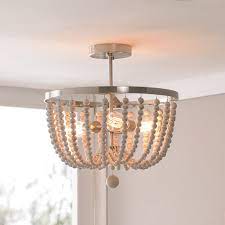 Installing new lighting can give a room a whole new look and feel. Zander Distressed White Wood Bead 3 Light Semi Flush Mount On Sale Overstock 21422701