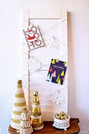 All you need is a piece of coloured card, a piece of white card, a picture/photo, a yoghurt lid. Diy Christmas Card Holder Hello Little Home