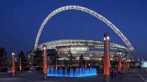 Named after the english national football stadium (presumably due to the shape of the stadium). Wembley Stadium Populous