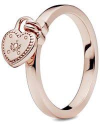 From pandora, gift the one you love the sparkling wishbone heart ring. Pandora Jewelry Rose United Regal Hearts Ring In Metallic Lyst