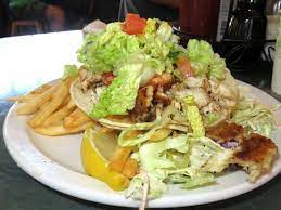 Charbroiled chicken or shredded beef with maui tacos rice, cheese and our fresh guacamole. Paia Fish Market Lahaina Restaurant