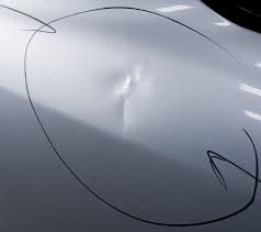 Key concept for minor dents & scratches: Paintless Dent Repair What Is Paintless Dent Repair Elmer S Auto Body
