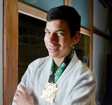 Aurora martial artist dedicates triumph to late father