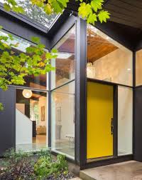 We couldn't decide what color to paint our faded weird yellow door for 2 years until we saw the paprika red wall mounted #modboxusa. Shop Vanillawood Modern Furniture Interior Design Boutique Modern Entrance Entrance Design Mid Century Exterior