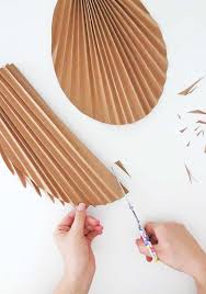 It is in 4 sections, so it has to be cut out and taped end to end to make one long palm. Diy Paper Palm Leaf Ohoh Deco