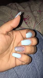 In love with the baby blue nails? Coffin Baby Blue Nails With Silver Glitter Baby Blue Nails Blue Glitter Nails Blue Acrylic Nails