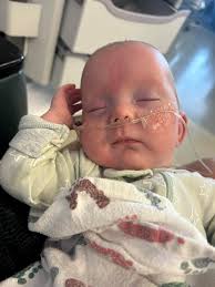 Baby Johnny's health progress and development at one week old