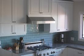 White kitchen cabinetry looks great when fitted with raised panel doors as they give some texture and depth to the design. 3 Blue Kitchen Backsplashes You Ll Love