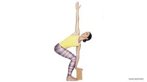 3 Ways To Modify Revolved Chair Pose Yogapedia Chair Pose Yoga Chair Pose Yoga Poses