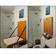 This Is A Change Table We Made To Fit Above Our Toilet The Mat Is Held In Place By Adhesiv Baby Changing Tables Foldable Changing Table Diaper Changing Table