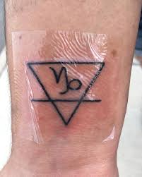 They are fond of music and art. Midsweettalk S First Tattoo On Another Person Its The Capricorn Symbol Inside The Alchemical Symbol For Earth Stoked To Have It On My Wrist Tattoo T Elements Tattoo Horoscope Tattoos