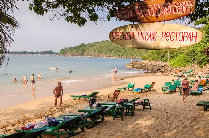 Jungle Beach Rumassala hidden secluded cove crystal-clear water snorkelling no crowds jungle trail Unawatuna Sri Lanka