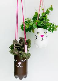Now is the perfect time to plant up baskets in order to give the plants a few weeks to establish before they are hung outside after the danger of frost has passed. How To Make Hanging Planters From Recycled Bottles Diy