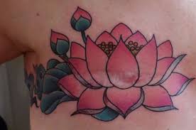 Elegant yellow blue black and red color ink tribal butterfly with colorful breast cancer tattoo on back for girls. 13 Powerful Photos Of Mastectomy Tattoos