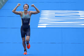 Flora duffy of bermuda holds her gold medal during a medal ceremony for the women's individual triathlon competition at the 2020 summer olympics, tuesday, july 27, 2021, in tokyo, japan. V6sn5jw2aveulm