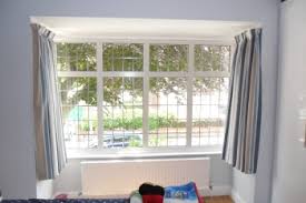 I want a rod with a center bracket and brackets at the two ends. Bay Window Curtain Rails Why I Won T Use Any But These