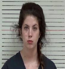 Woman charged with assault of man who died