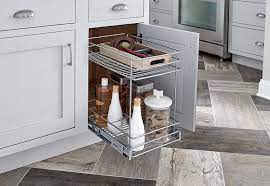 Pull out kitchen storage solutions and fittings for kitchen base cabinets. 32104 2 Tier Pull Out Basket