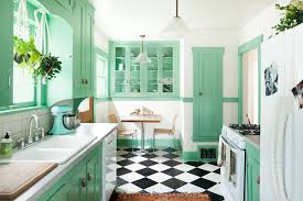 This is an example of a large country open plan kitchen in philadelphia with a farmhouse sink, shaker cabinets, quartz benchtops, red splashback, brick splashback, panelled appliances, light hardwood floors, with … 15 Best Green Kitchen Cabinet Ideas Top Green Paint Colors For Kitchens