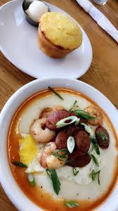 It is cooked in an iron pan over an open fire using butter, shortening, or cooking oil. Shrimp And Grits With Sausage And Cornbread Food Grits Cornbread