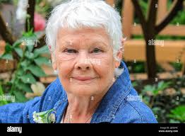 Actress with flowers hi-res stock photography and images