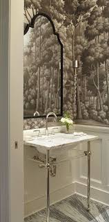 Trim on the bottom, wallpaper on top.i think it may look nice to have some architectural details in your house especially since you can see it right when you walk in. Trend Wallpapered Bathrooms Lewis S