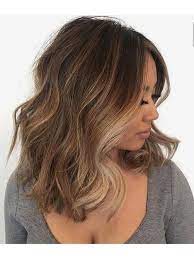 Split them in the middle and you'll get a beautiful frame for. 35 Brown Hair With Blonde Highlights Looks And Ideas Southern Living