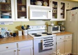 The cabinet doors and the surface of the frame will all need to be thoroughly cleaned with soap and water or a cleaning agent such as trisodium phosphate to remove dirt, grime, grease and body. Diy Kitchen Cabinets Simple Ways To Reinvent The Kitchen Bob Vila