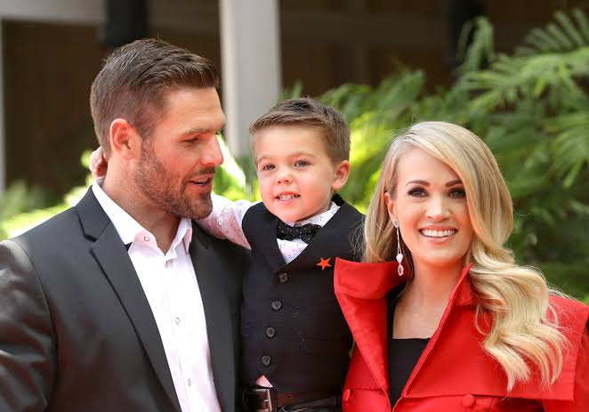 Carrie Underwood steps out with husband Mike Fisher: What to know about their family - ABC News
