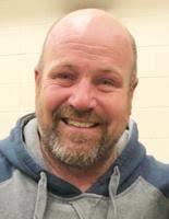 Strader lights the way for Tomcats: QB, defense help fend off Rams