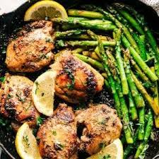 Lemon Garlic Butter Herb Chicken With Asparagus Recipe Yummly Recipe Chicken Thights Recipes Asparagus Recipe Lemon Herb Chicken