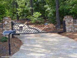 Firstly, if you're coming home late at night, you can open the gate from the. Installing Automatic Driveway Gates Vs A Manual Entry Gate Diy Driveway Gate Installation Tips Driveway Gate Maintenance Issues The Homebuilding Remodel Guide