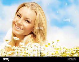 Girl in daisy field hi-res stock photography and images