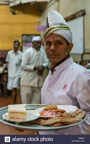 Vertical Portrait Of A Waiter Inside The Famous College Street Coffee House In Kolkata Aka Calcutta India Stock Photo Alamy